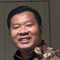 Randy M. Tampubolon